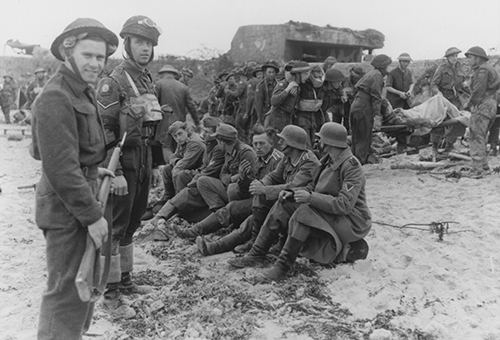 German Prisoners under guard on Nan White Beach