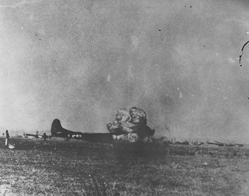 A tow plane behind the Waco glider crash-lands and explodes