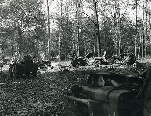 Jeeps damaged by mortar and artillery fire