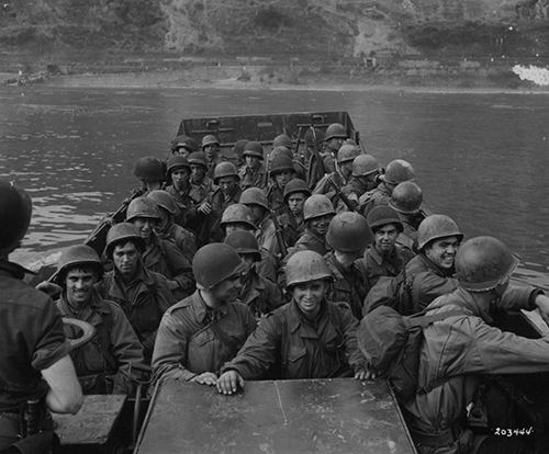 Landing craft carries US 3rd Infantrymen