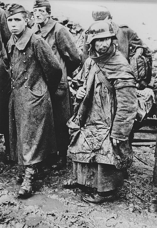 Exhausted German infantry captured by the Americans