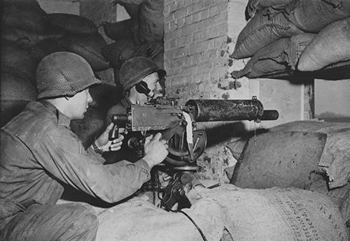 An American machine-gun crew of the 102nd Division