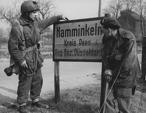 Airborne troops study a sign outside Hamminkeln