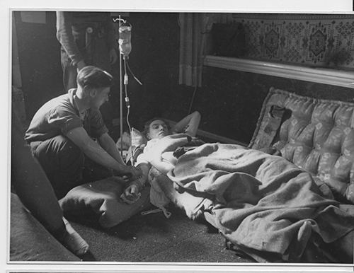 Soldier receiving treatment