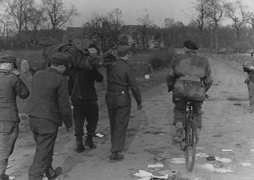 Germans carrying their own wounded.