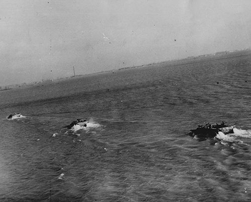 Buffalo amphibous trucks carrying British troops