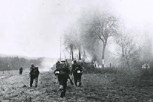 Browse German soldiers advance during Ardennes offensive.