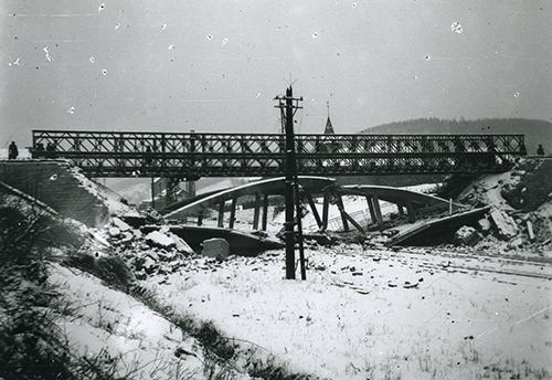 A blown bridge during the Ardennes Offensive