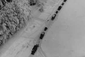 Browse A transport column moves up through the snow