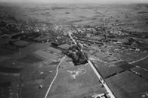 Browse A bombed Bastogne in May 1945