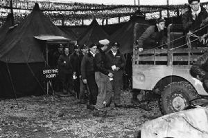 9th Tactical Airforce Pilot Officers leave a briefing