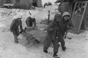 Browse A patrol from 30th Division rescue an injured German soldier