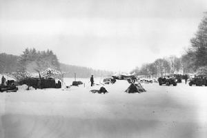 Browse Camouflage netting hides 912th Field Artillery Battaliion