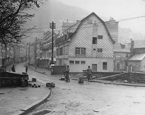 30th Division guard a demolition prepared bridge