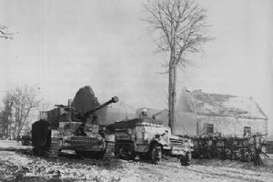 Browse A knocked out German tank near Foy