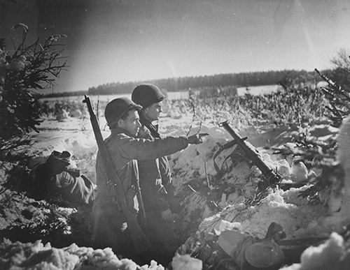 Two soldiers from the 36th Armored Infantry Regiment