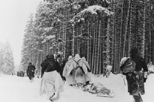 Browse American troops drag a heavily loaded ammunition sled