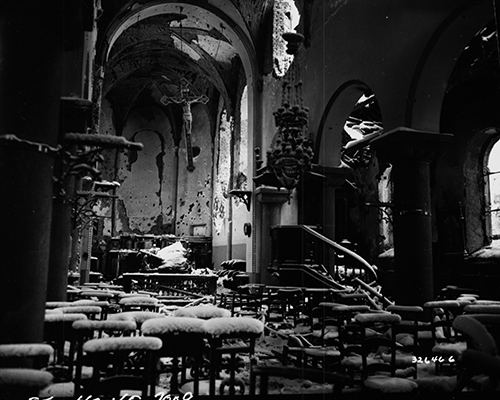 Snow covered ruins of a Belgian church