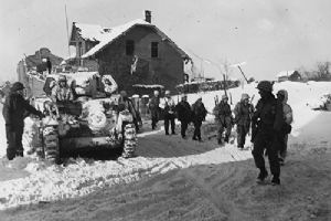 Infantrymen moving toward enemy positions in St Vith