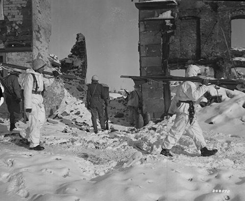 Medics of the infantry pick up their fellow soldiers