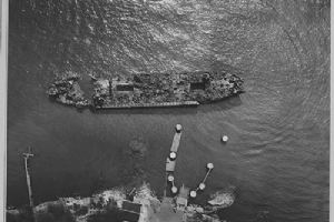 Browse Overhead view of the burned out hulk of USS LST-480